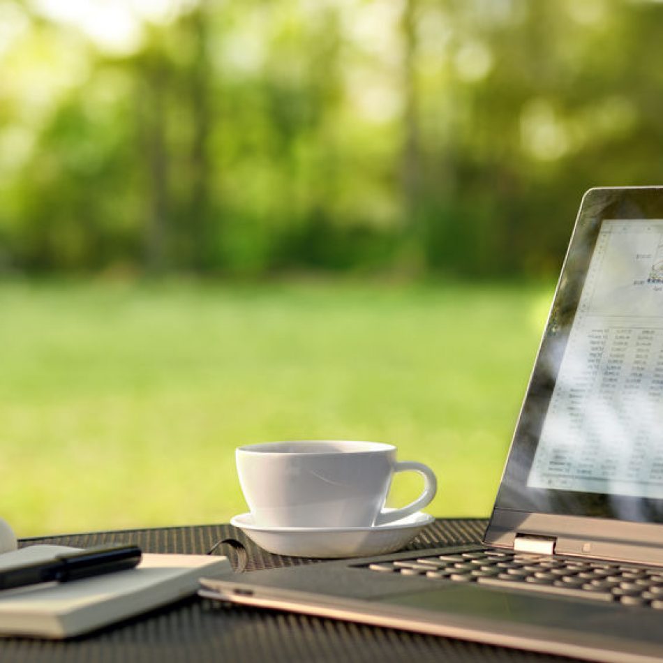39344590 - laptop and coffee in outdoor office